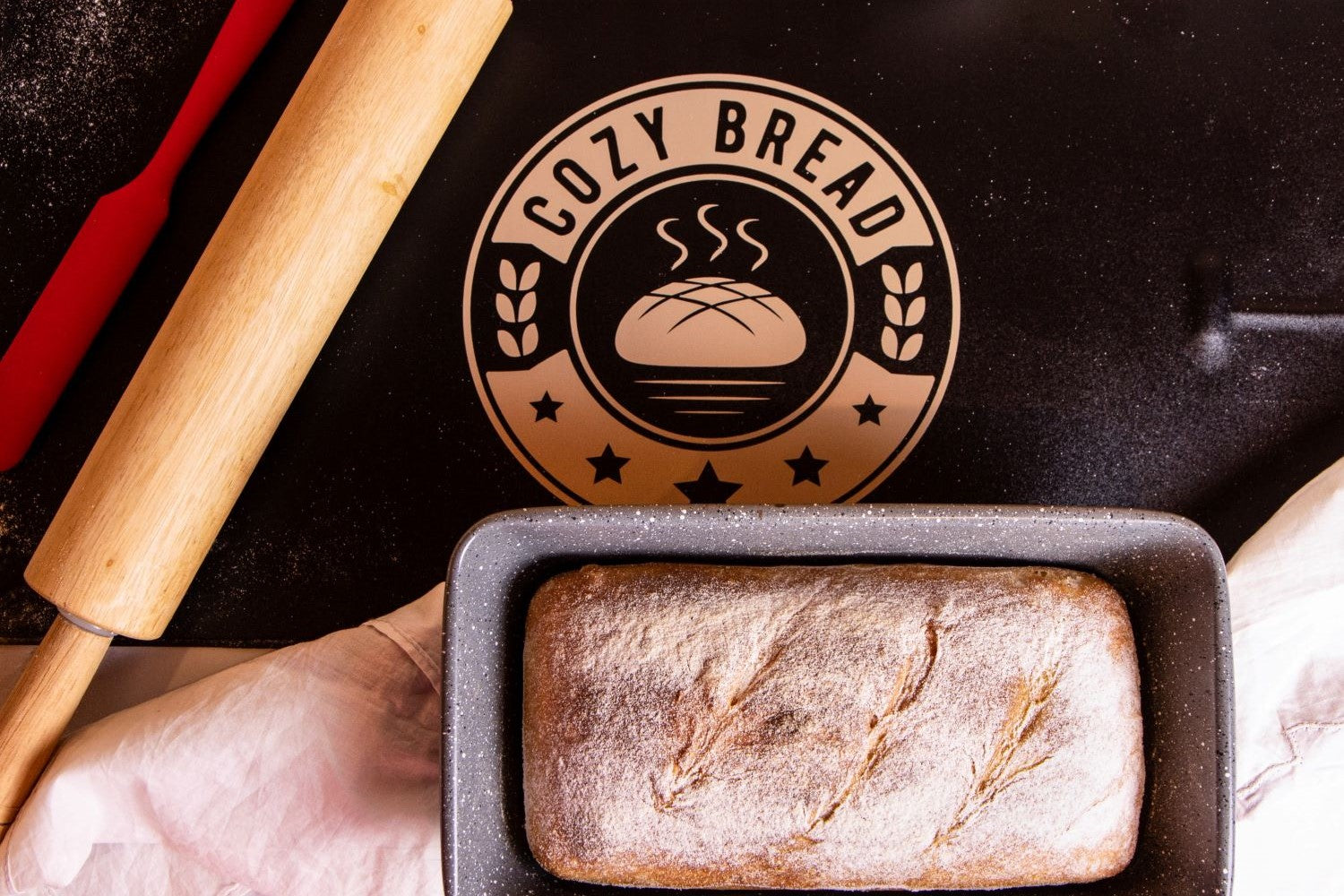 Cozy Bread Proofing Mat & Baked Loaf with baking tools